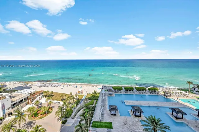 a view of a city with an ocean