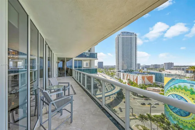 a view of balcony with furniture