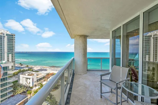 a view of a ocean from a balcony