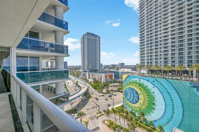 a swimming pool with outdoor seating and yard