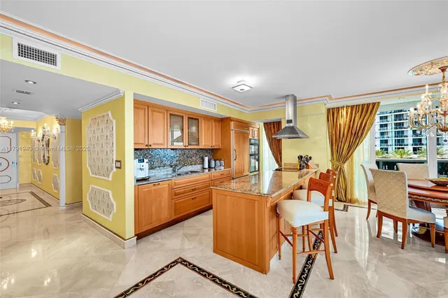 a living room with furniture a flat screen tv and floor to ceiling window