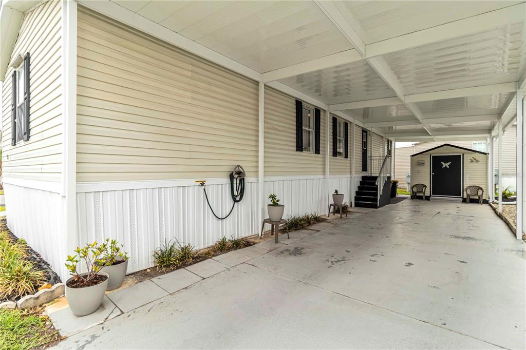10303 Burnt Store Road, Unit 230 Punta Gorda, FL 33950 - Photo 23 of 27 a view of a house with a backyard