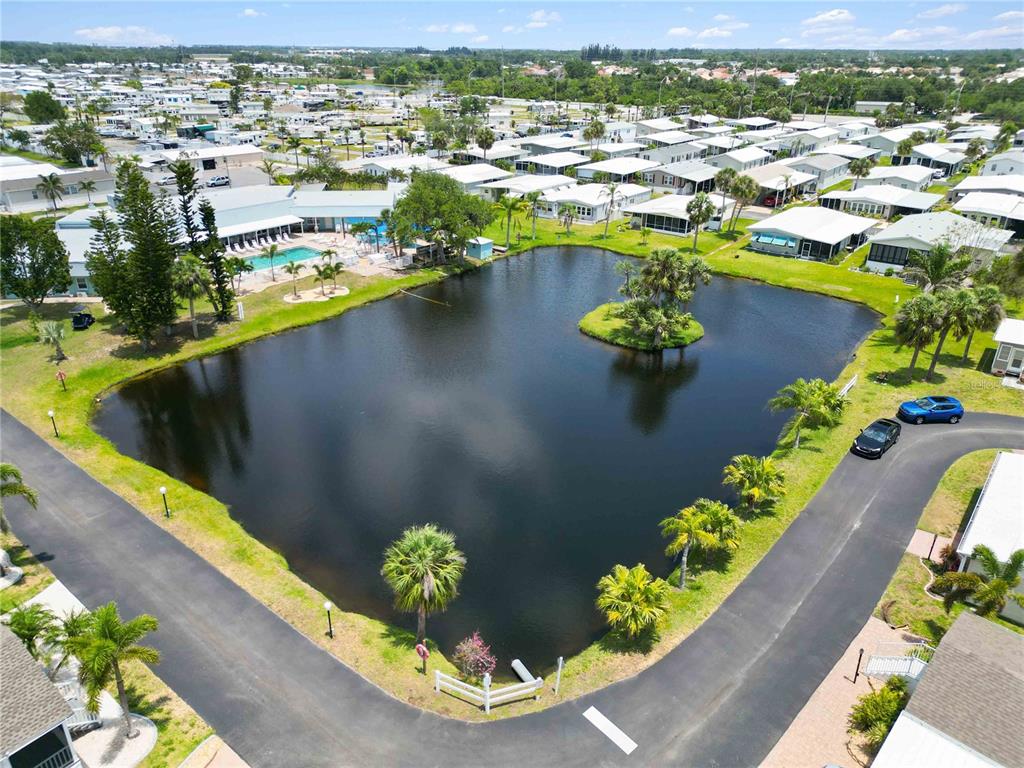 10303 Burnt Store Road, Unit 230 Punta Gorda, FL 33950 - Photo 24 of 27 a view of a lake with a city view