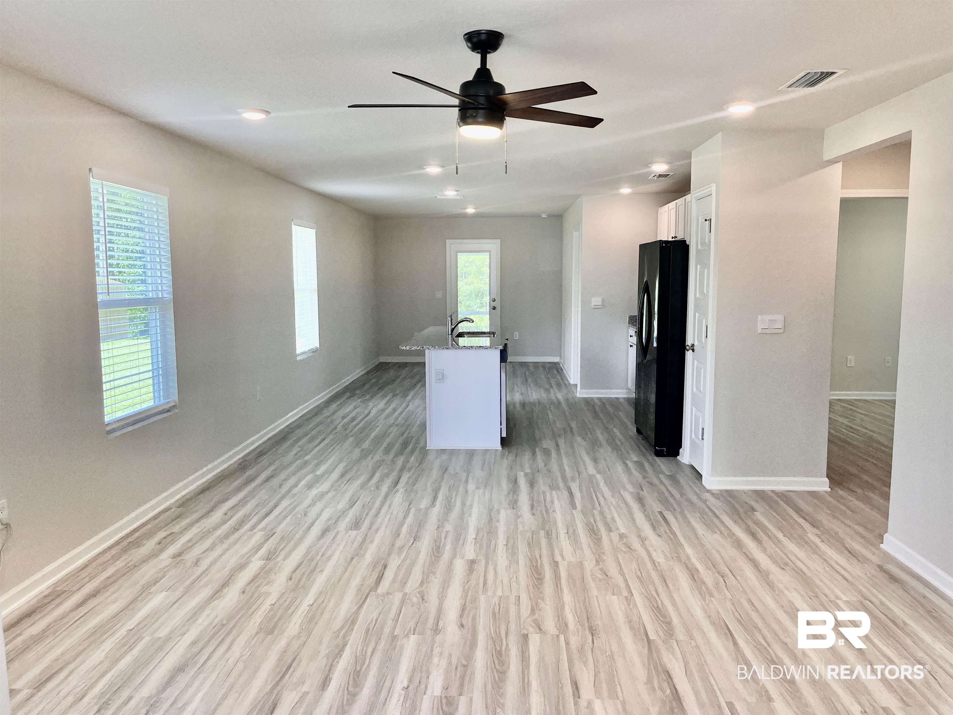 8891 Summer Bay Lane Foley, AL 36535 - Photo 12 of 54 Bedrooms 2 & 3 and 2nd bathroom on right.
