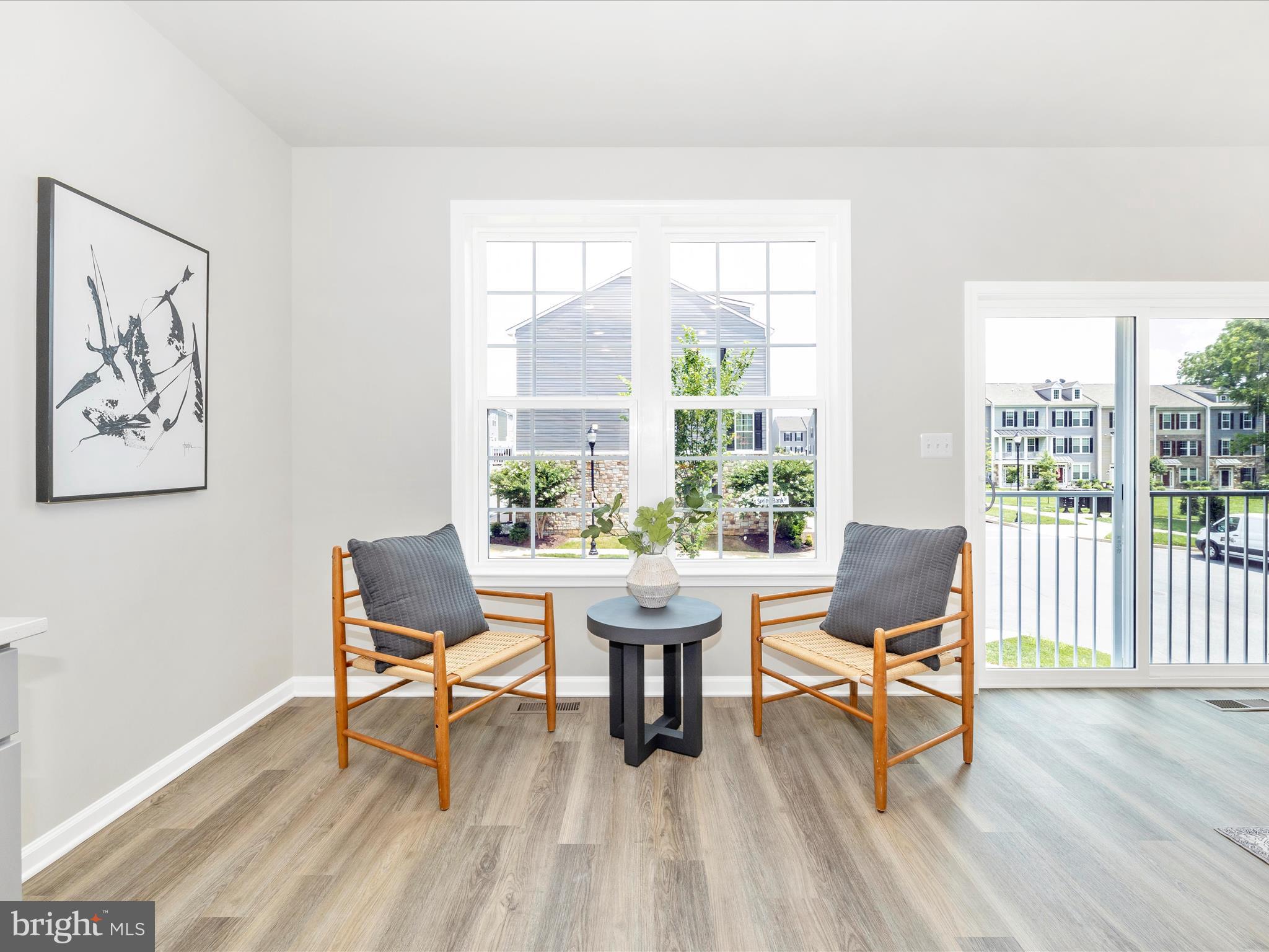 100 Spring Bank Way Frederick, MD 21701 - Photo 22 of 43 a workspace with wooden floor and a window