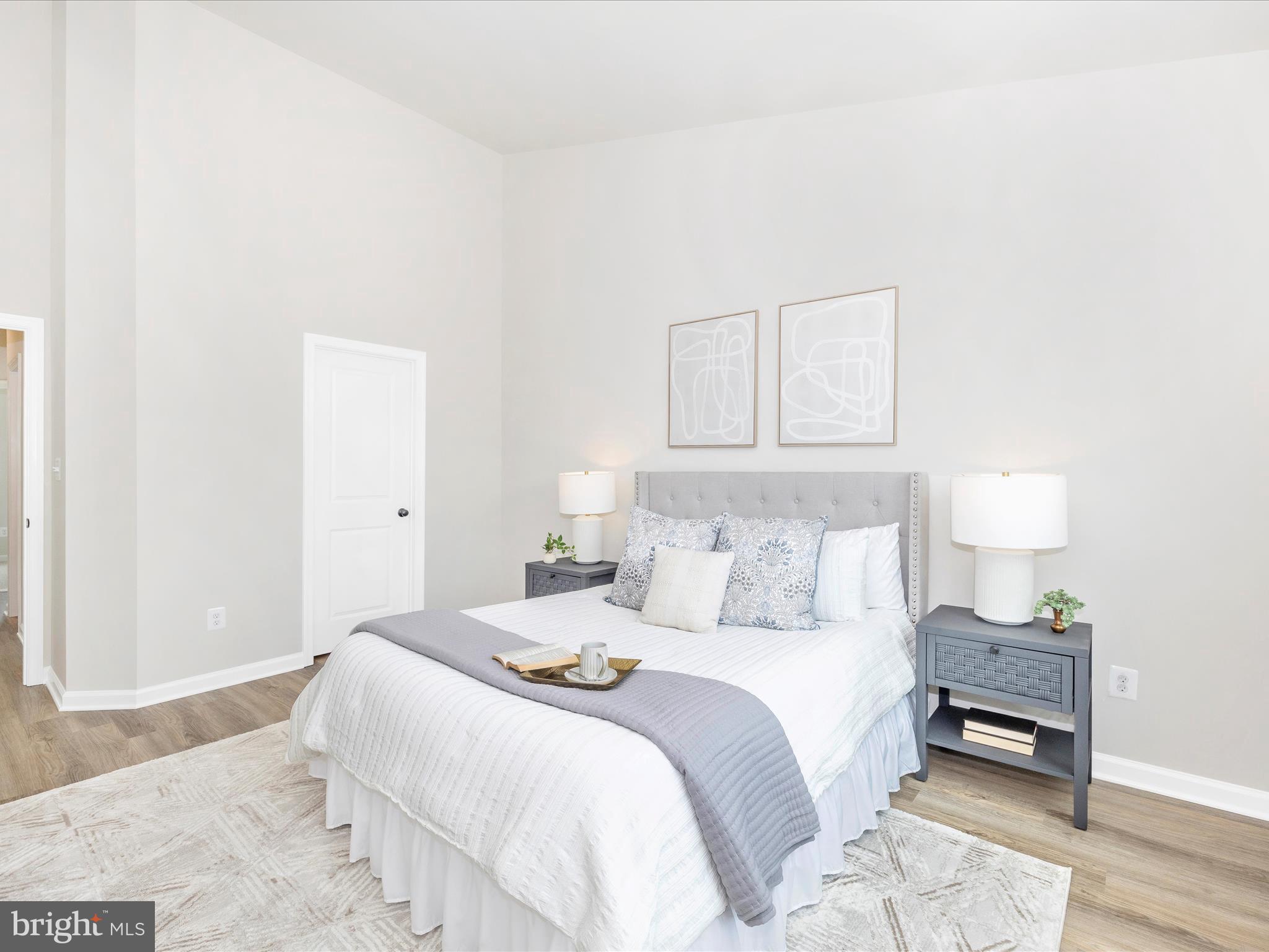 100 Spring Bank Way Frederick, MD 21701 - Photo 28 of 43 a bedroom with a bed and a night stand