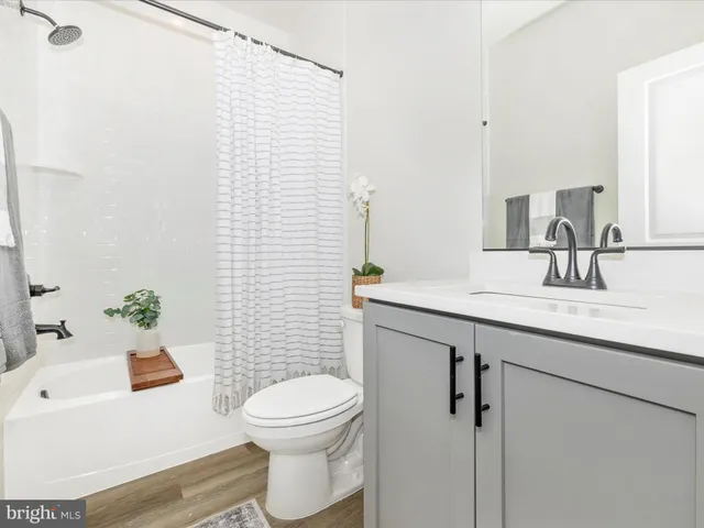 a view of a building with a yard