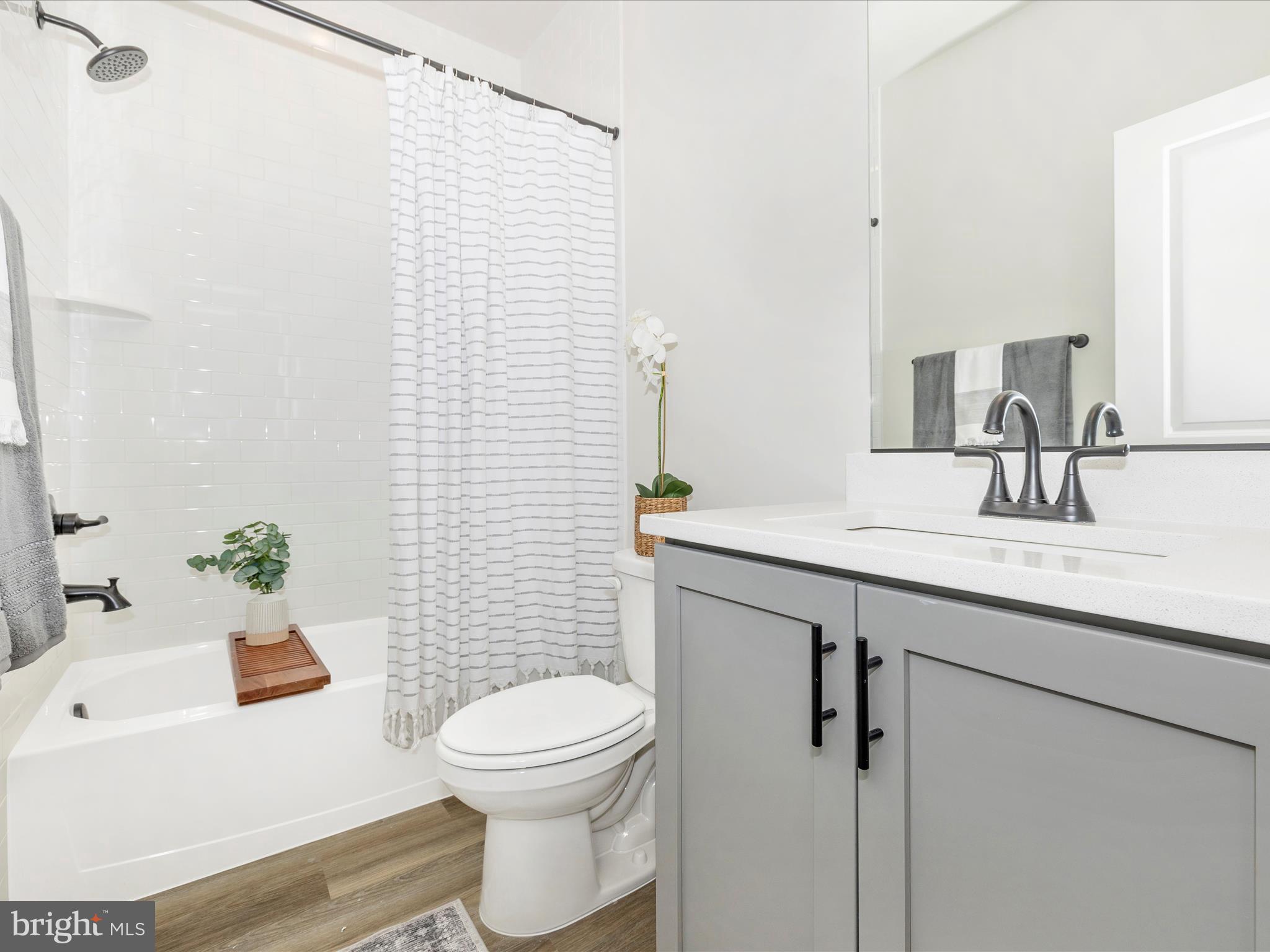 100 Spring Bank Way Frederick, MD 21701 - Photo 36 of 43 a bathroom with a sink a toilet and shower