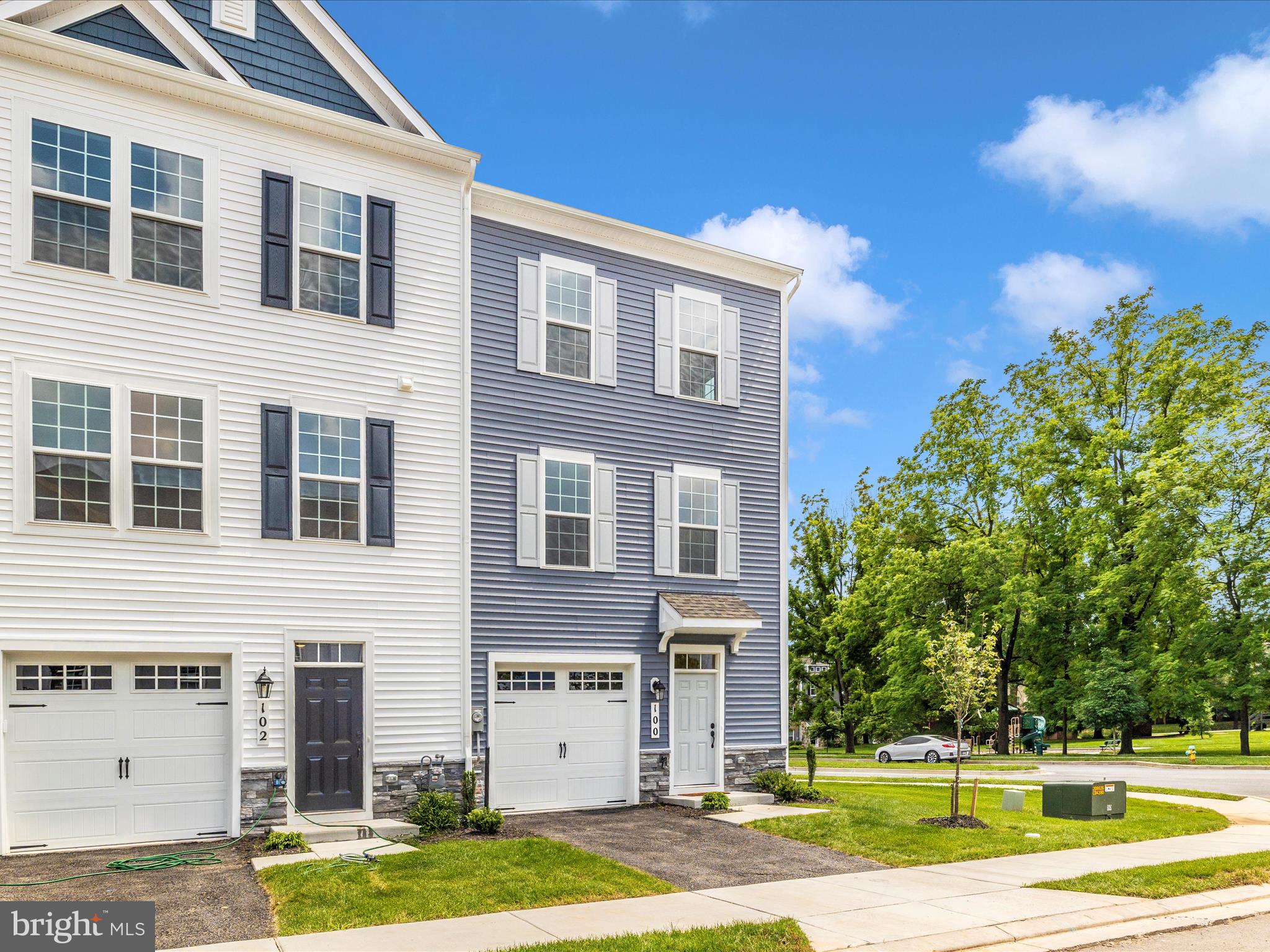 100 Spring Bank Way Frederick, MD 21701 - Photo 38 of 43 a view of a building with a yard