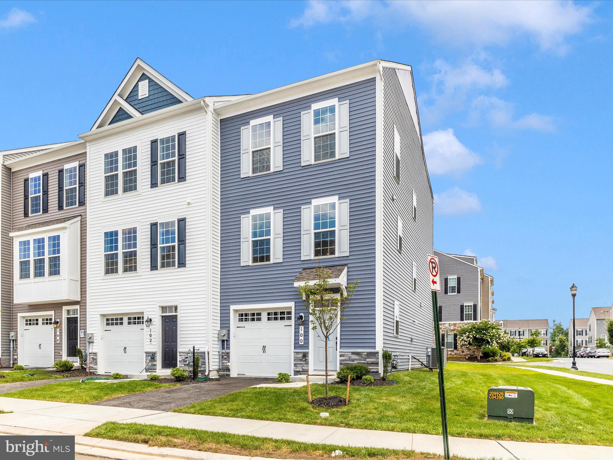 100 Spring Bank Way Frederick, MD 21701 - Photo 39 of 43 a front view of a house with a yard