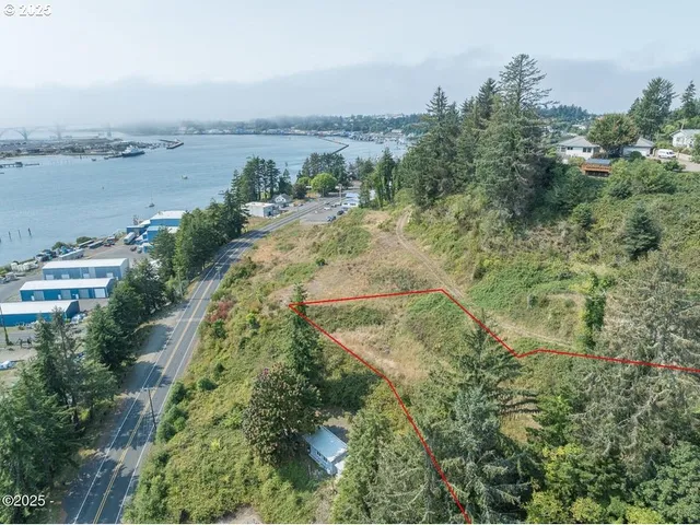 a view of a lake with a yard