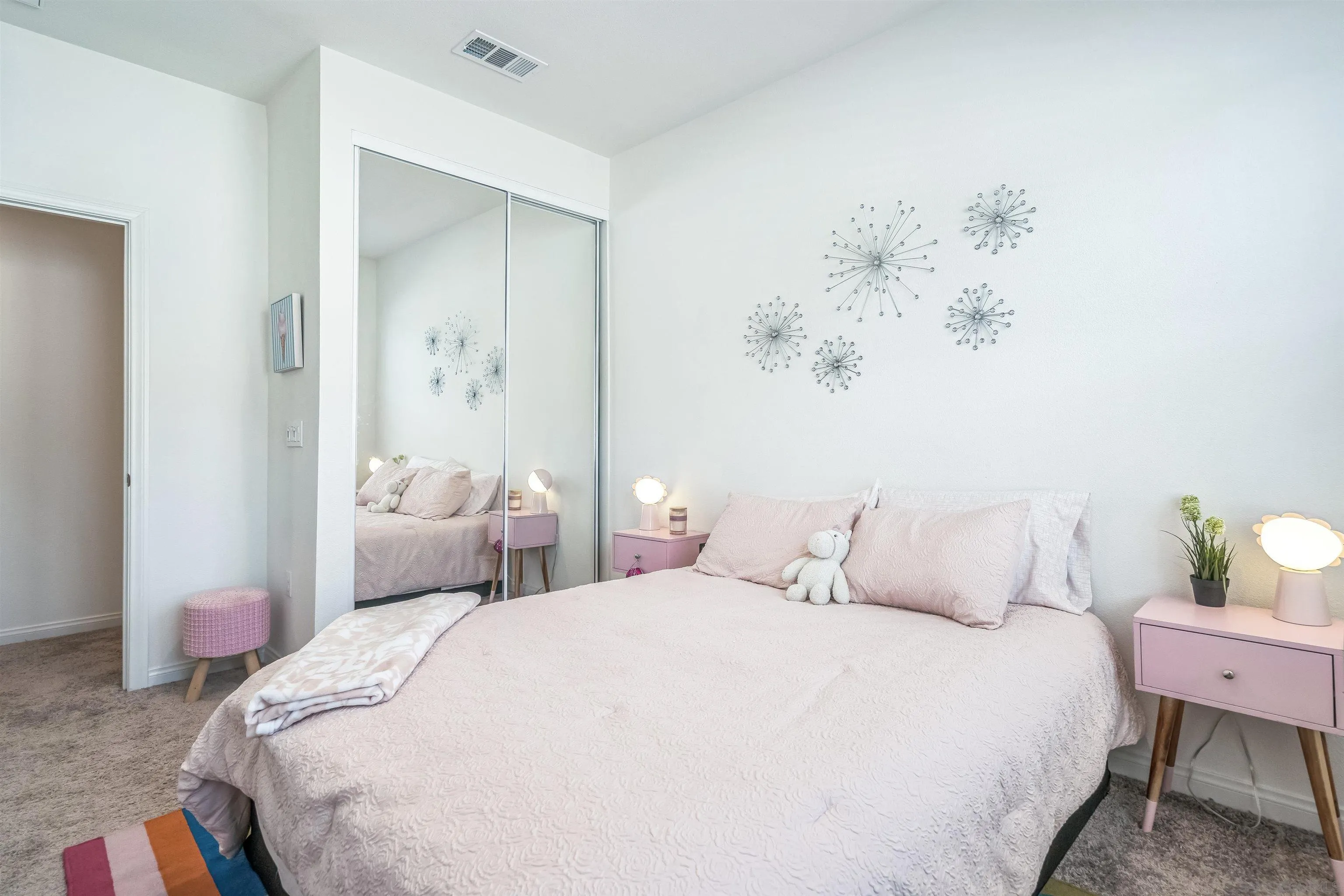 2018 Barite Street Spring Valley, CA 91977 - Photo 38 of 47 a bedroom with a bed and a painting on the wall