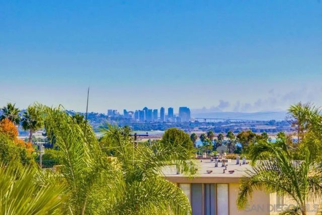 a view of a chairs and table in a yard