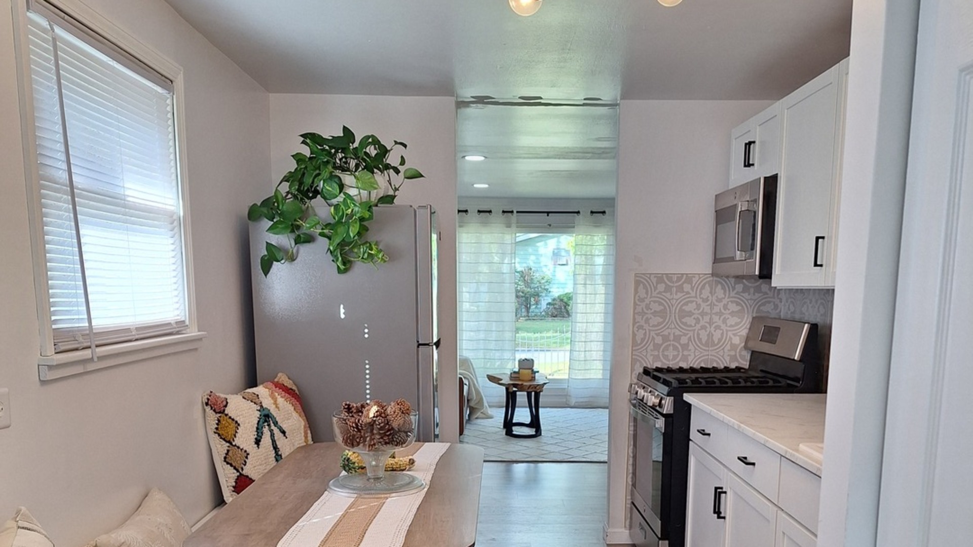 16519 Honore Avenue Markham, IL 60428 - Photo 8 of 26 a kitchen with stainless steel appliances granite countertop a stove a sink and a refrigerator