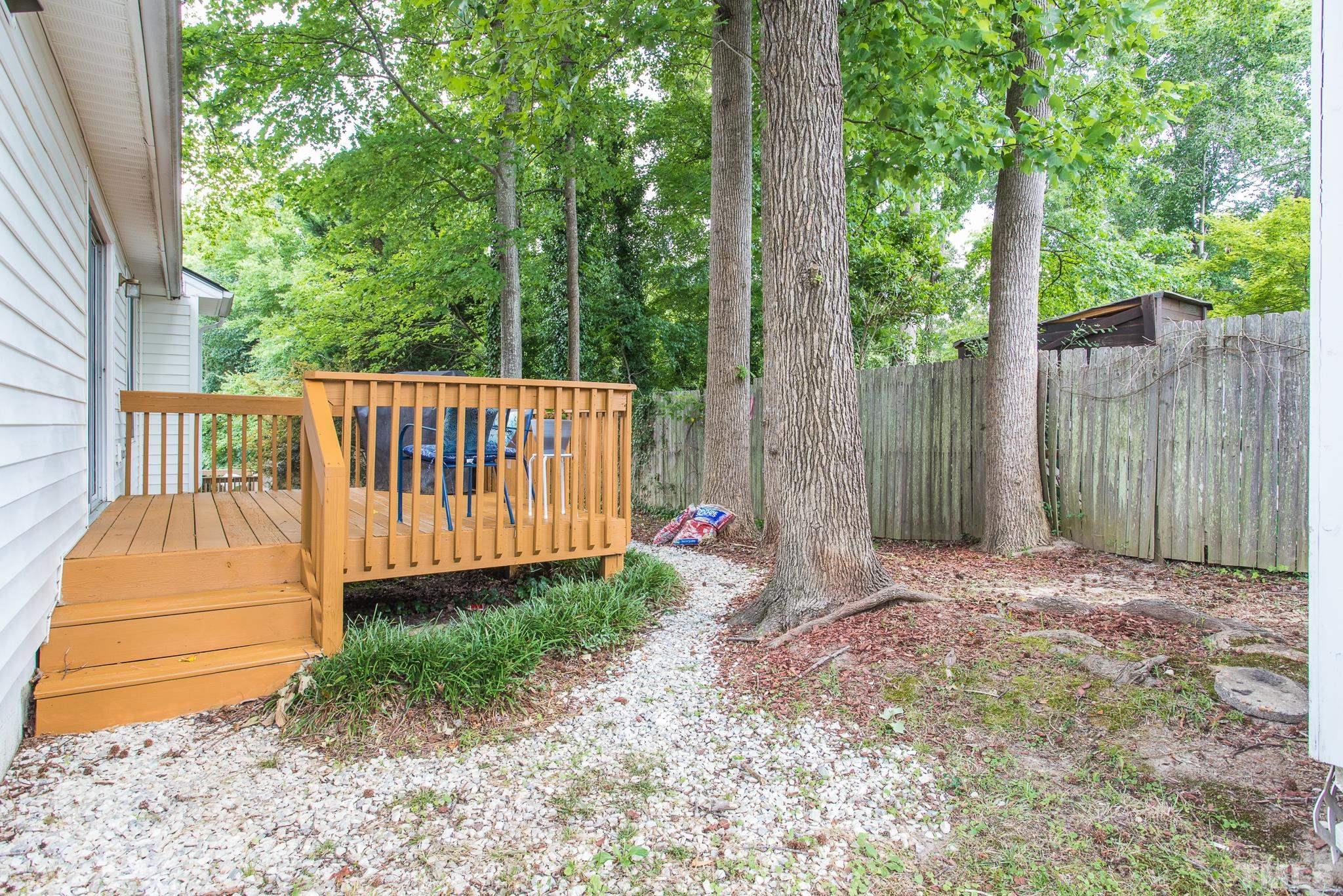 2109 Havering Place Raleigh, NC 27604 - Photo 8 of 35 a view of a backyard with a small cabin