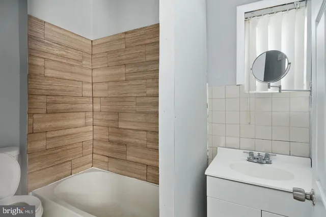 a bathroom with a sink and a toilet
