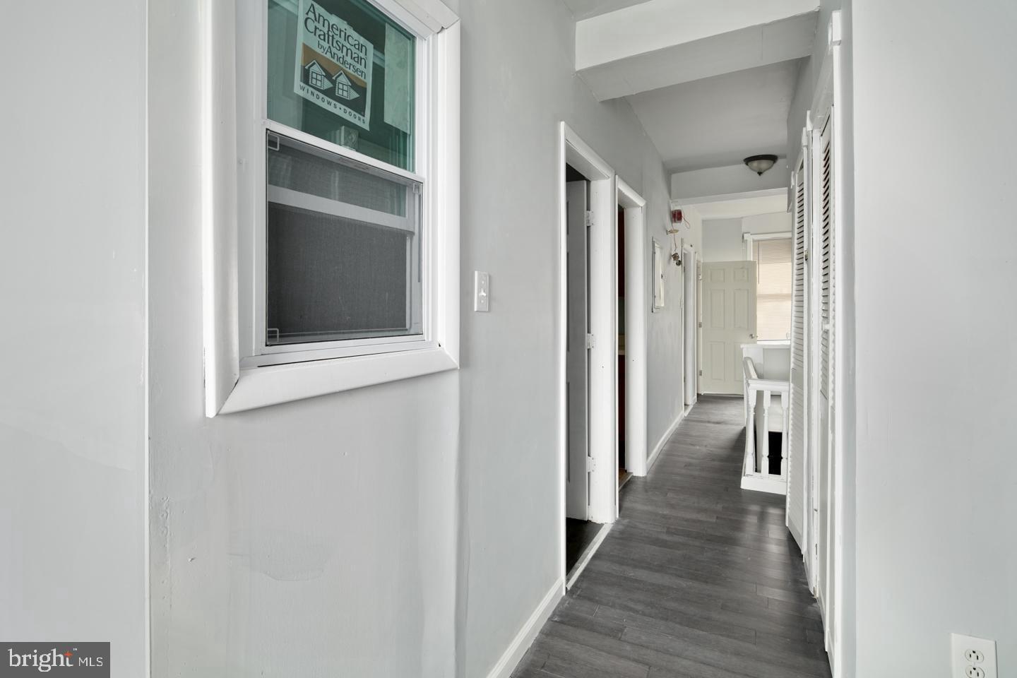 3428 North 23rd Street, Unit 3 Philadelphia, PA 19140 - Photo 4 of 14 a view of a hallway with wooden floor and staircase