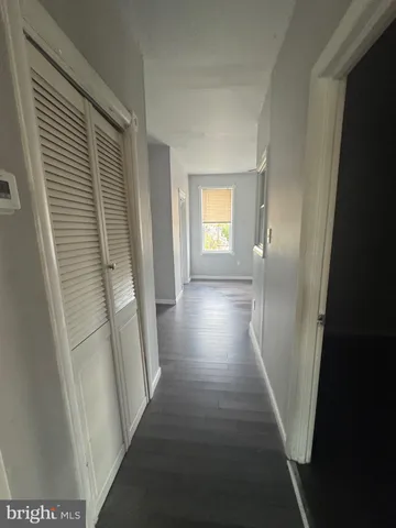 a kitchen with stainless steel appliances granite countertop a sink refrigerator and microwave