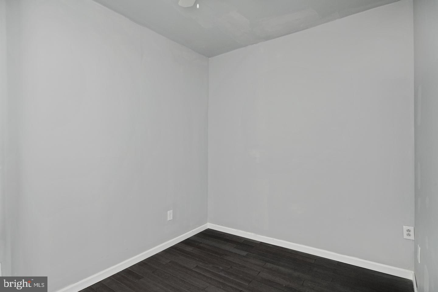 3428 North 23rd Street, Unit 3 Philadelphia, PA 19140 - Photo 10 of 14 a view of an empty room with wooden floor