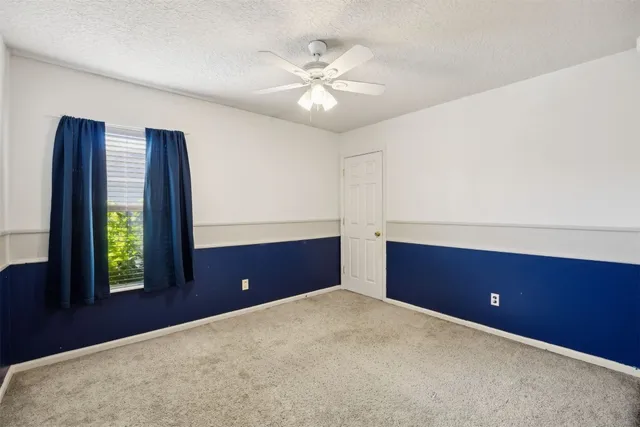 a view of yard with outdoor seating and green space