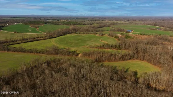a view of lake with green space