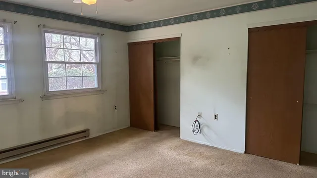 an empty room with windows