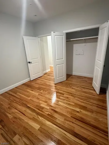 a view of a hallway of a house
