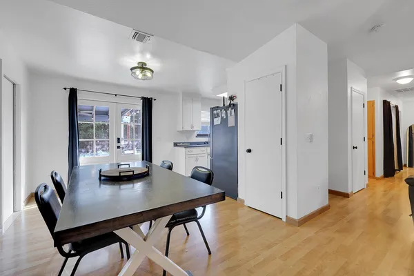 a view of a dining room with furniture