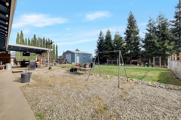 a view of a park with swings