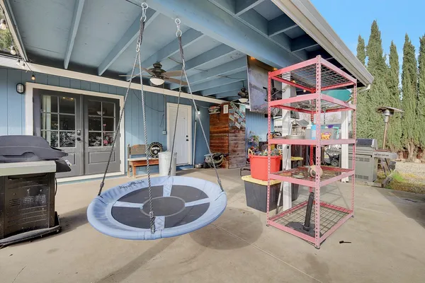 a view of a chairs and tables in patio