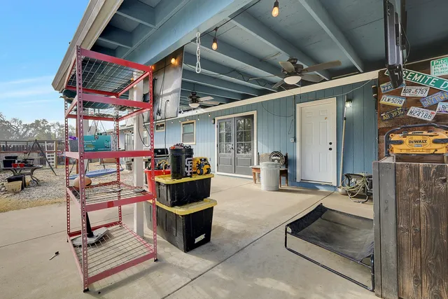 a outdoor living space with patio furniture and a potted plant