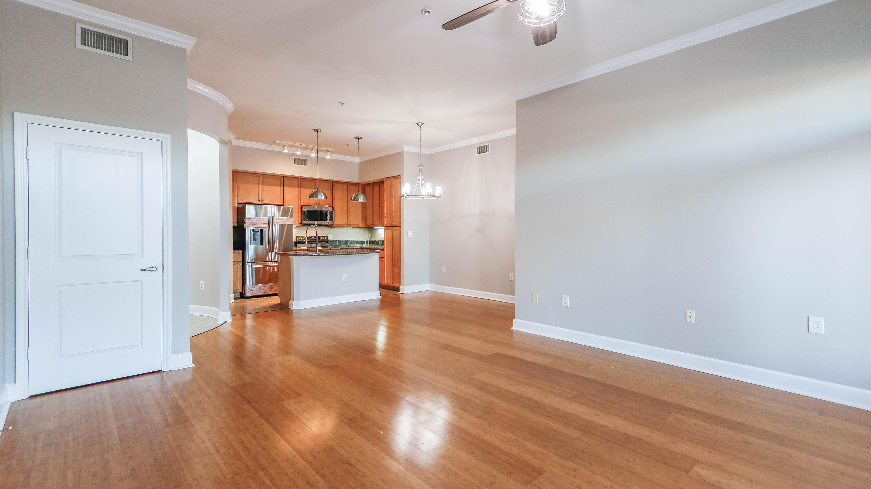 8700 Front Beach Road, Unit 1311 Panama City Beach, FL 32407 - Photo 16 of 65 a view of a kitchen and an empty room