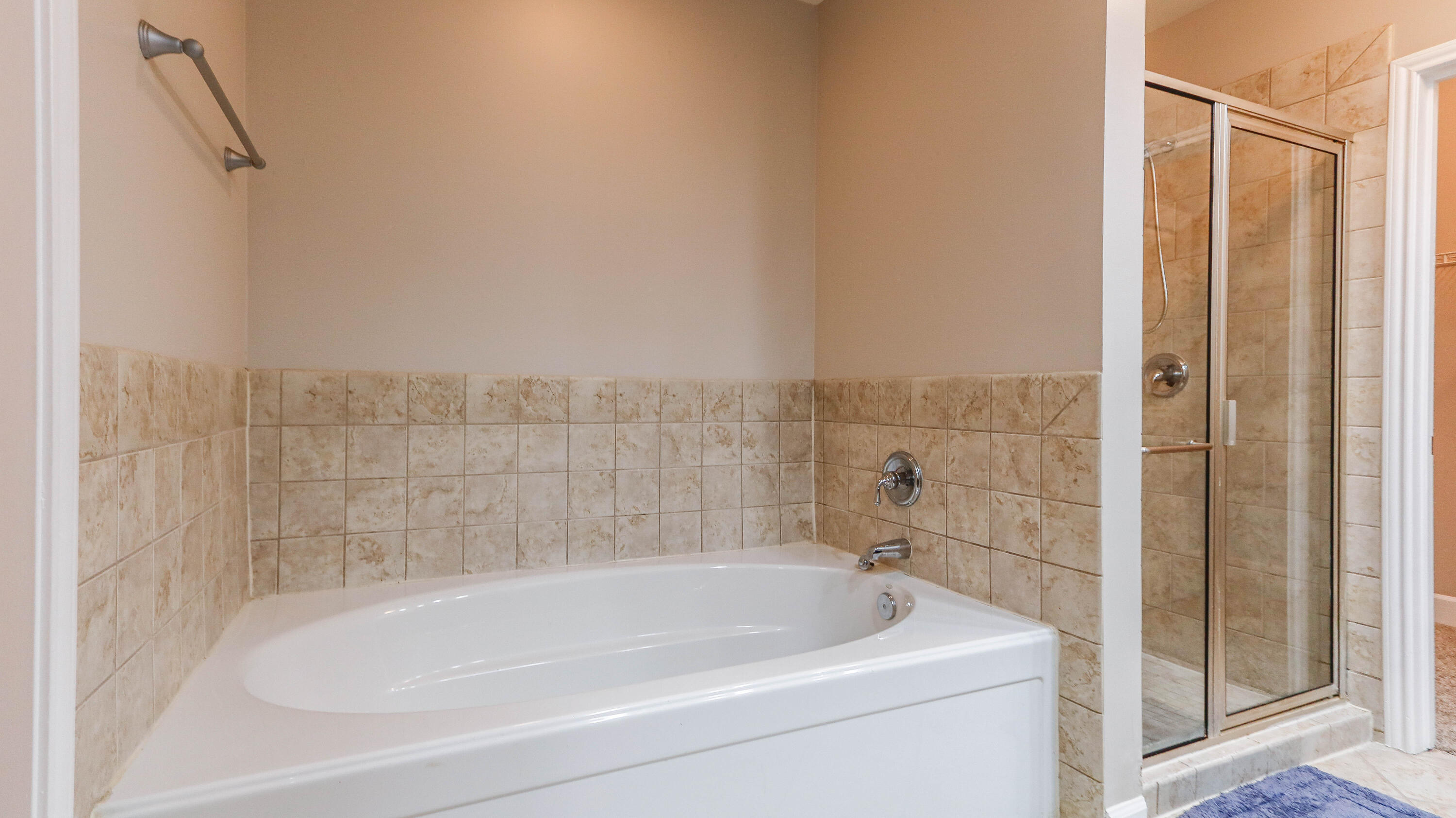8700 Front Beach Road, Unit 1311 Panama City Beach, FL 32407 - Photo 37 of 65 a bathroom with a bathtub and shower