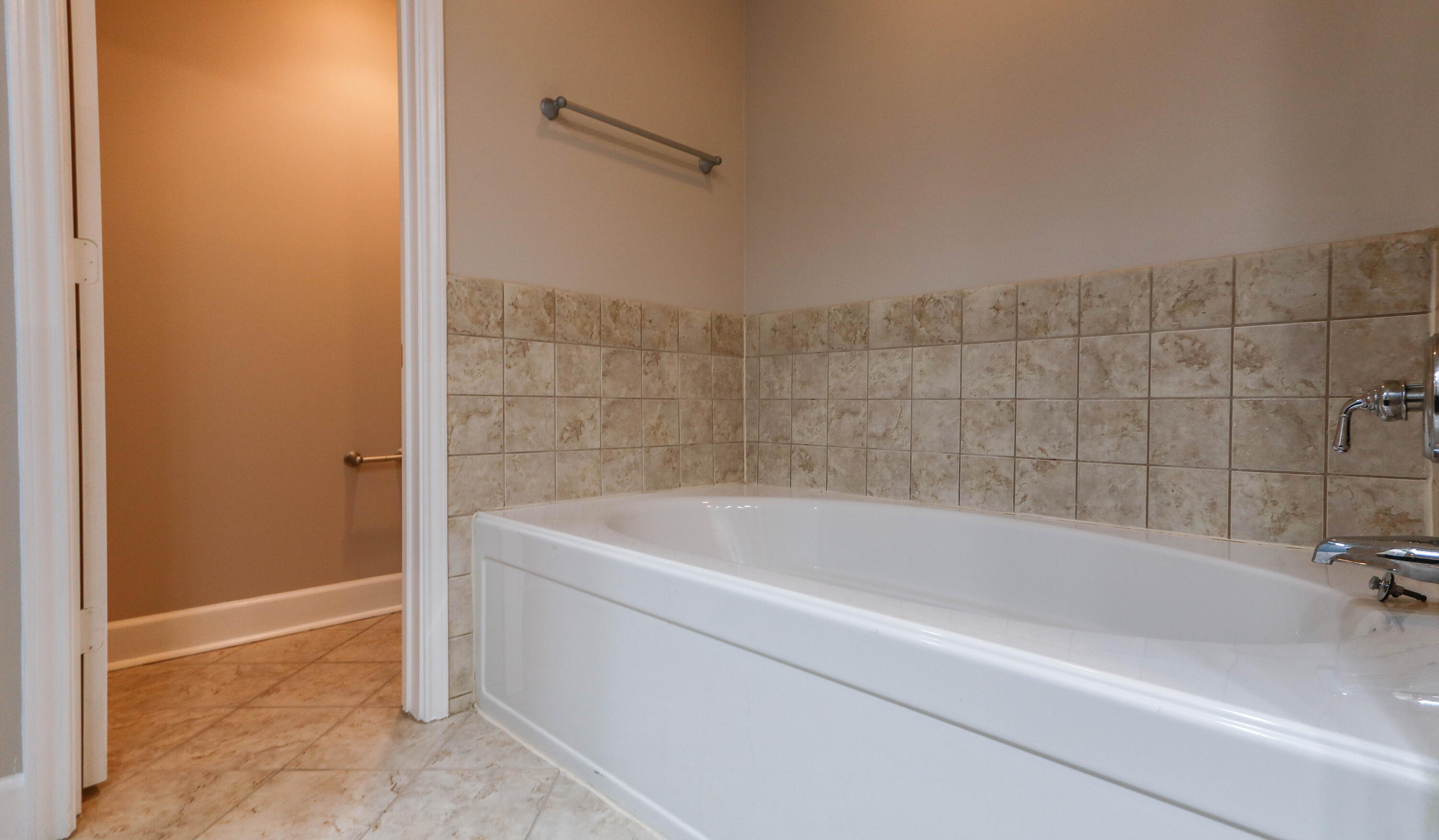 8700 Front Beach Road, Unit 1311 Panama City Beach, FL 32407 - Photo 38 of 65 a bathroom with a bathtub