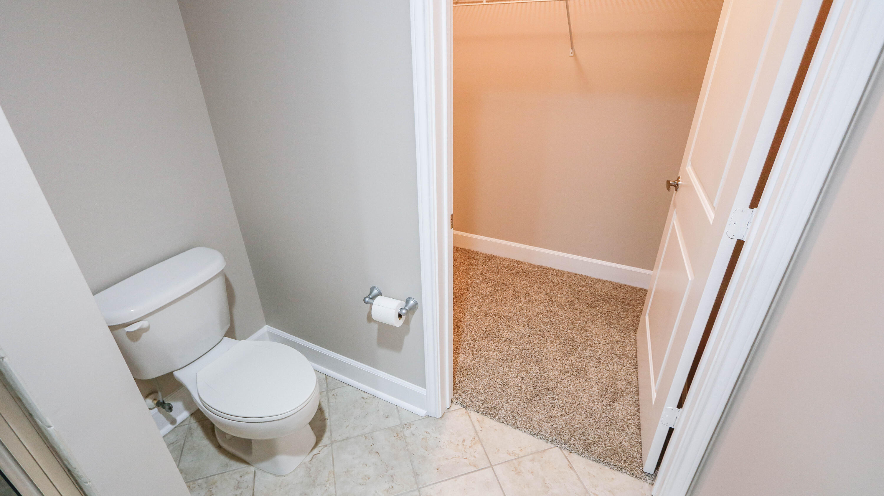 8700 Front Beach Road, Unit 1311 Panama City Beach, FL 32407 - Photo 47 of 65 a white toilet sitting next to a small tub