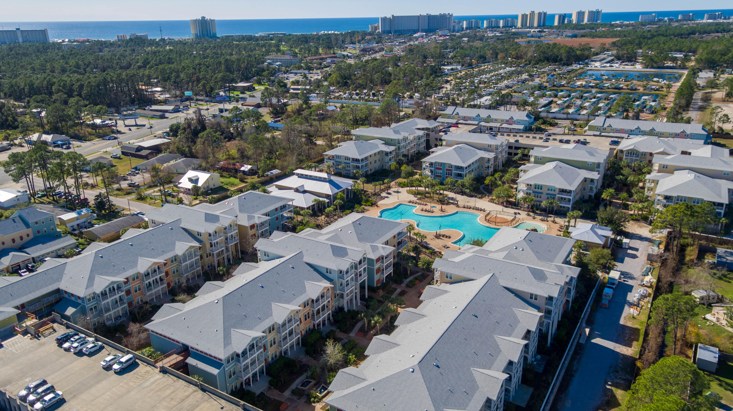 8700 Front Beach Road, Unit 1311 Panama City Beach, FL 32407 - Photo 50 of 65 an aerial view of a city with lots of residential buildings