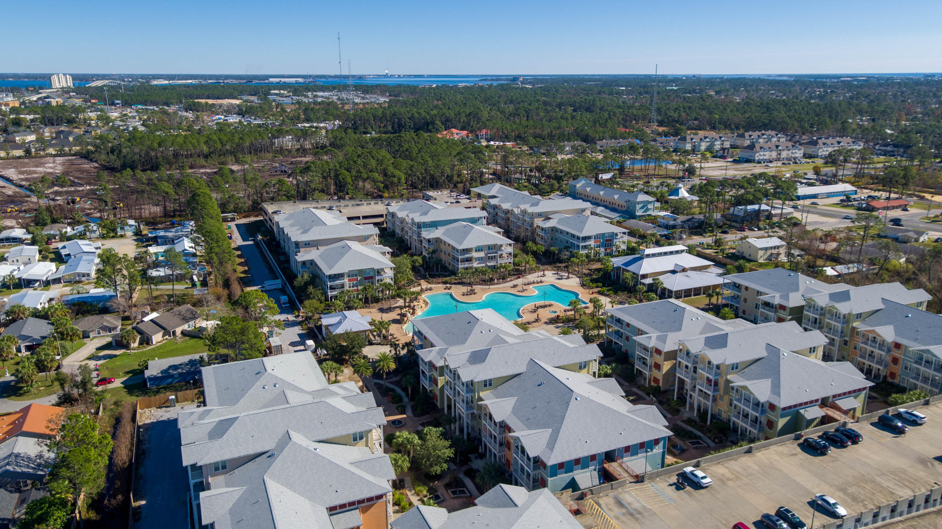 8700 Front Beach Road, Unit 1311 Panama City Beach, FL 32407 - Photo 58 of 65 an aerial view of a city with lots of residential buildings