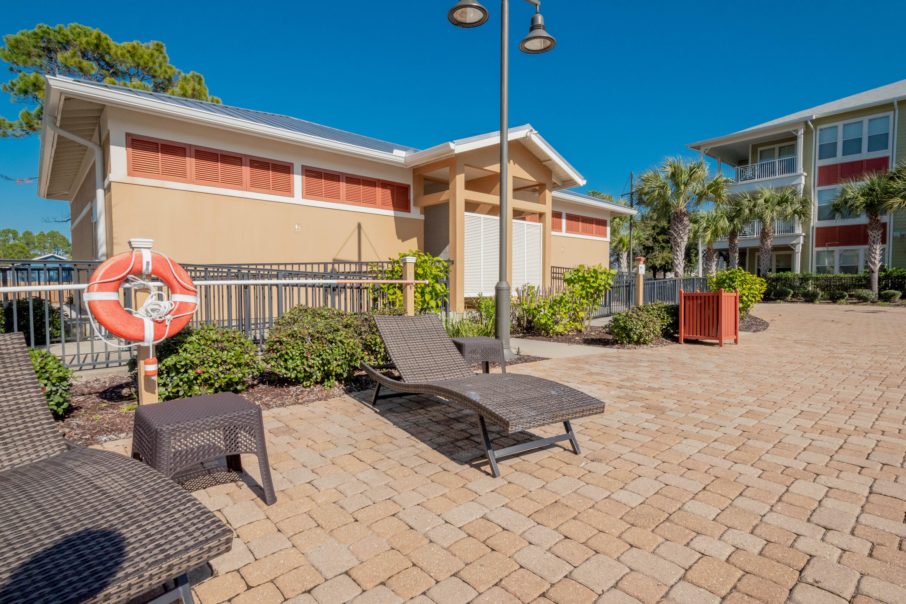 8700 Front Beach Road, Unit 1311 Panama City Beach, FL 32407 - Photo 60 of 65 a front view of a house with garden