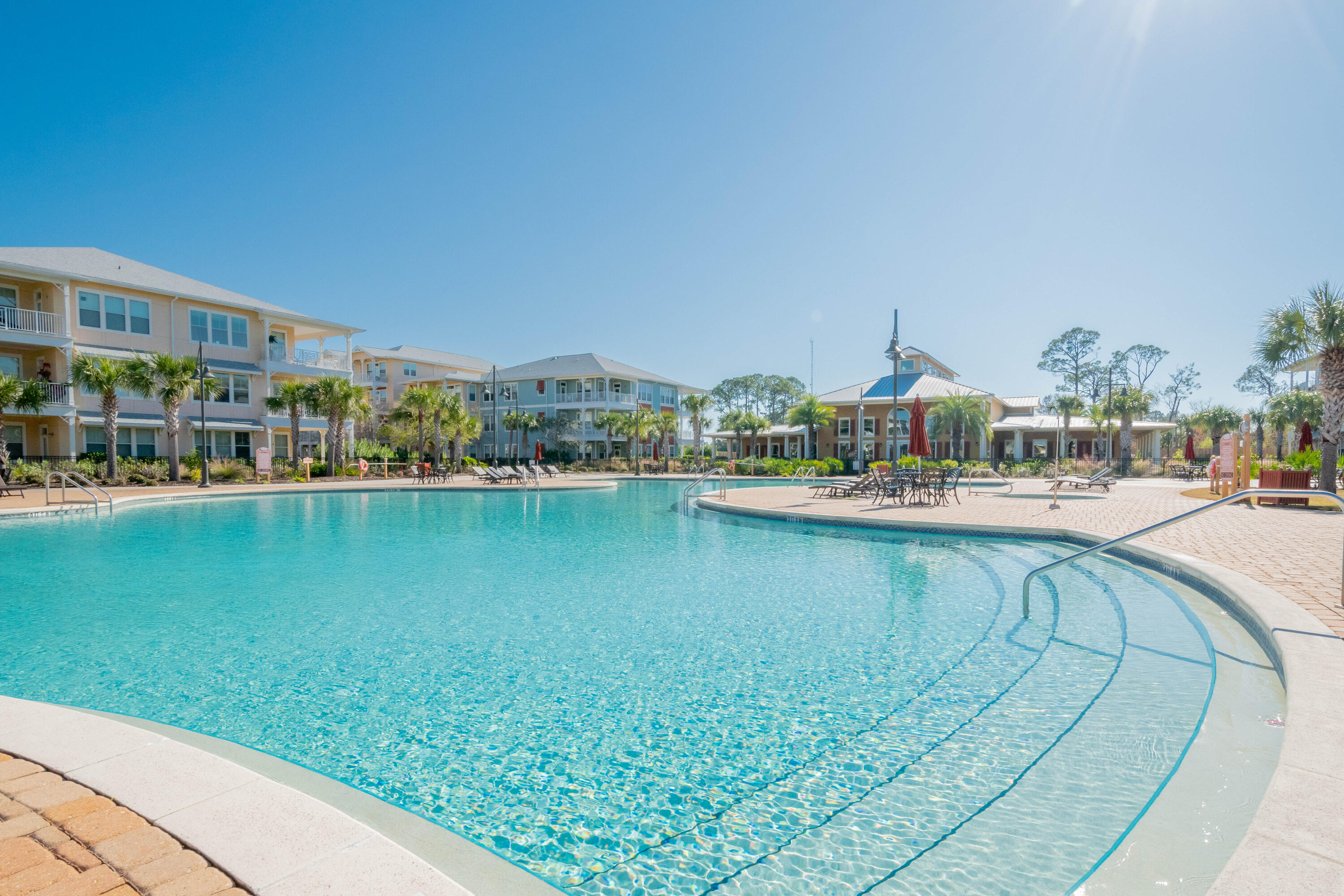 8700 Front Beach Road, Unit 1311 Panama City Beach, FL 32407 - Photo 6 of 65 a view of a swimming pool and outdoor space