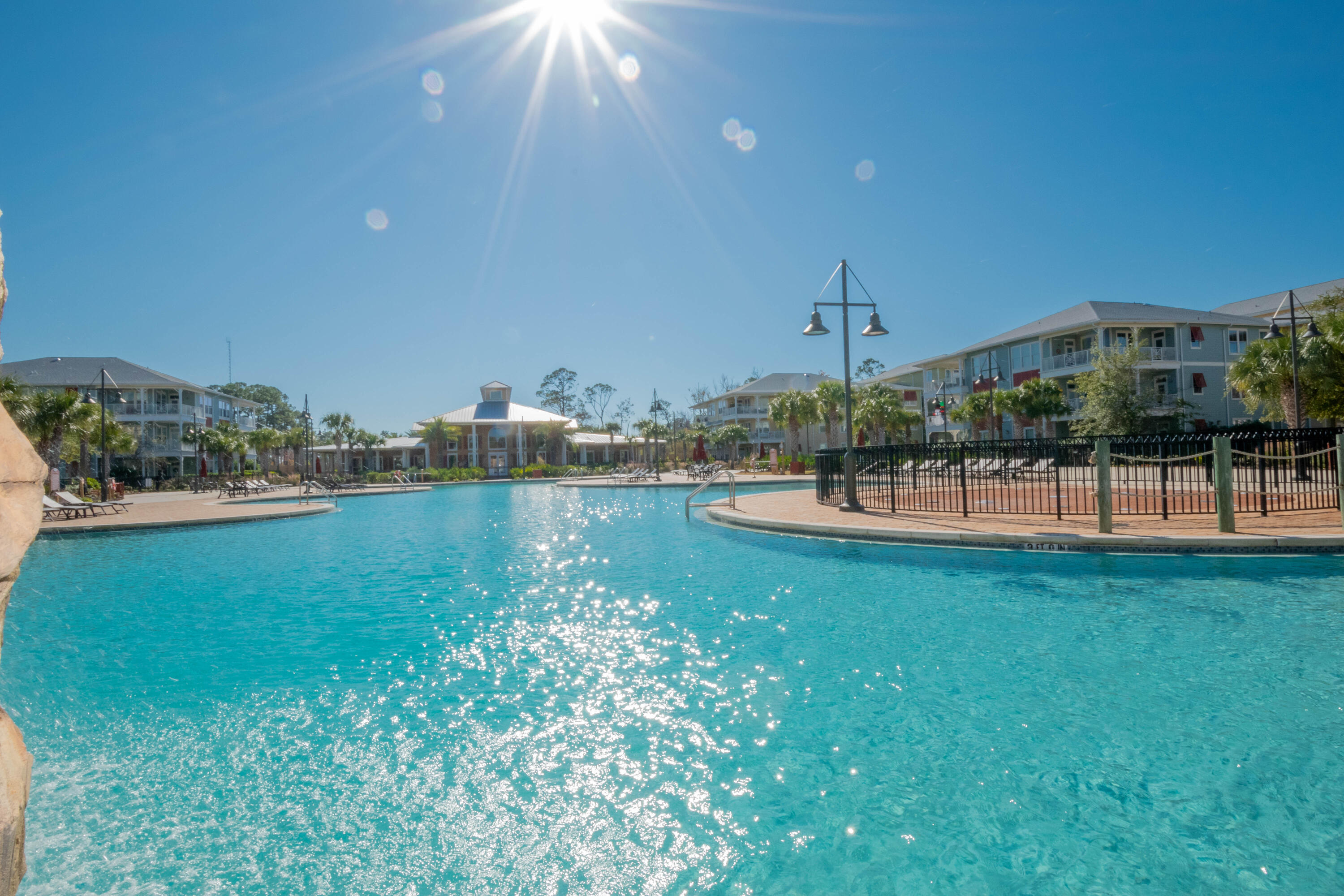 8700 Front Beach Road, Unit 1311 Panama City Beach, FL 32407 - Photo 64 of 65 a view of a lake with a big yard