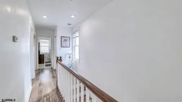 a view of hallway with stairs