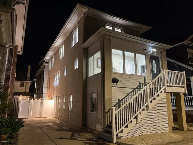 a view of a house with a glass door