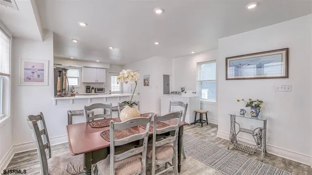 a view of a dining room with furniture