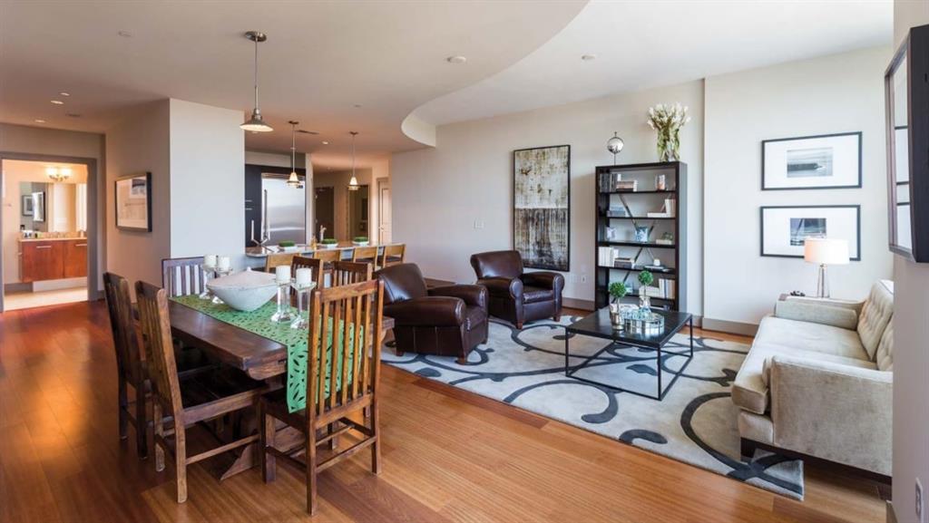 2171 Peachtree Road, Unit 1403 Atlanta, GA 30309 - Photo 5 of 25 a work room with furniture wooden floor and windows