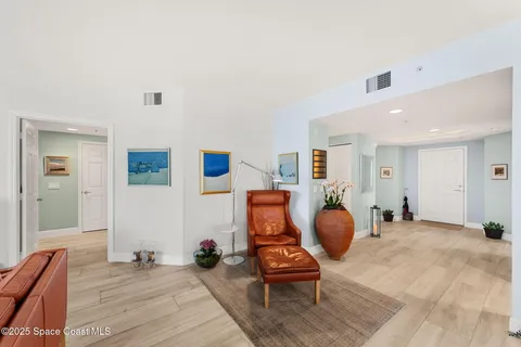 a view of balcony with furniture
