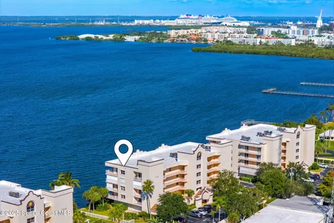 a view of a city with an ocean view