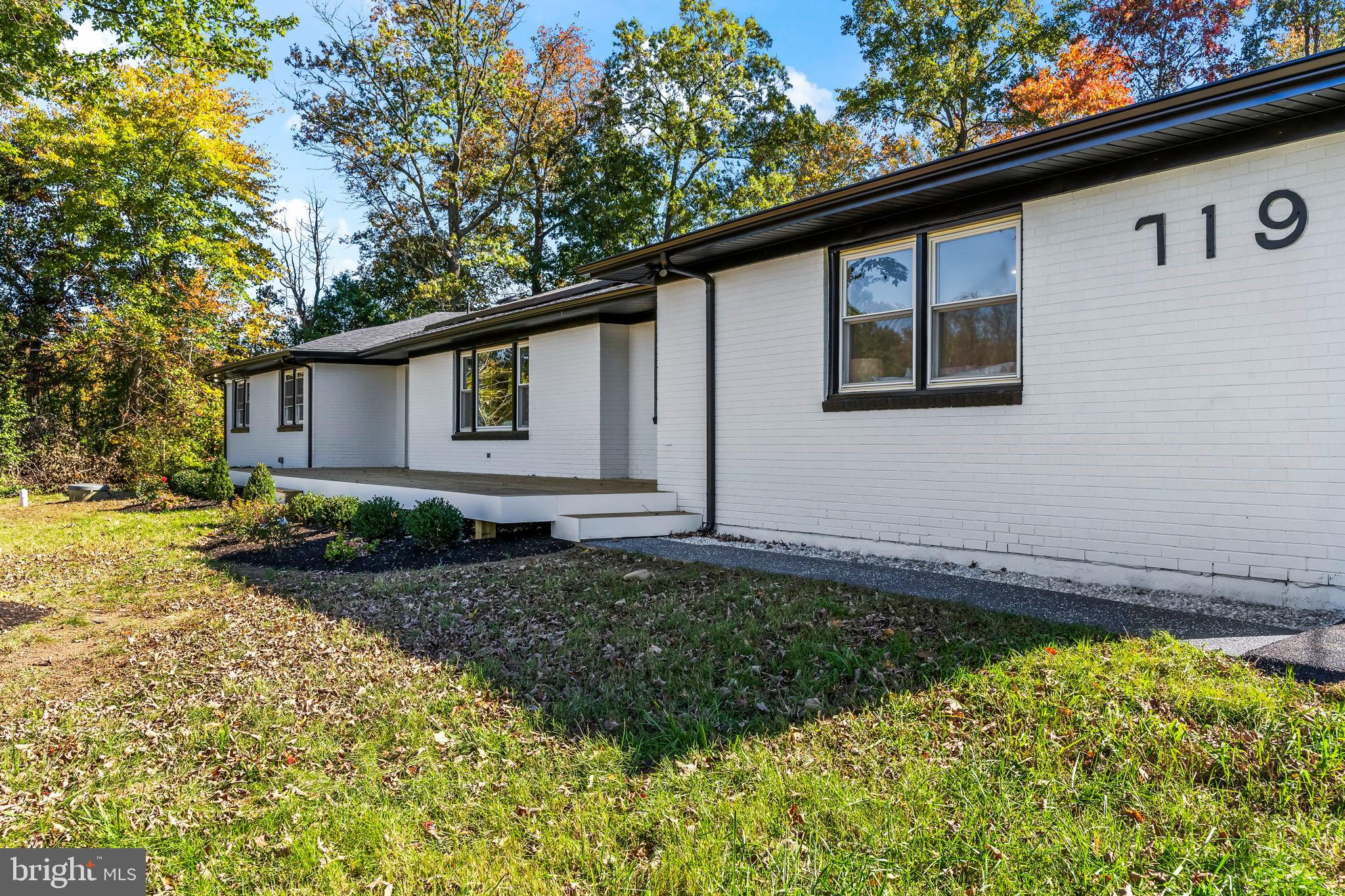 719 Manning Road East Accokeek, MD 20607 - Photo 7 of 36 Charming home nestled in vibrant greenery.