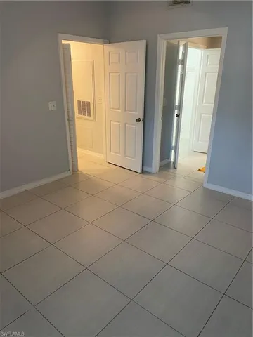 a view of a room that has a window in it