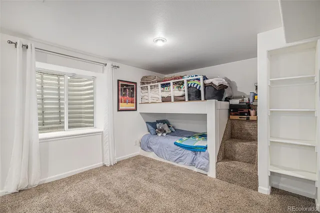 a view of livingroom with furniture and a window