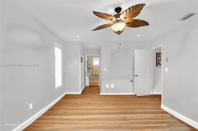 a view of an empty room and window